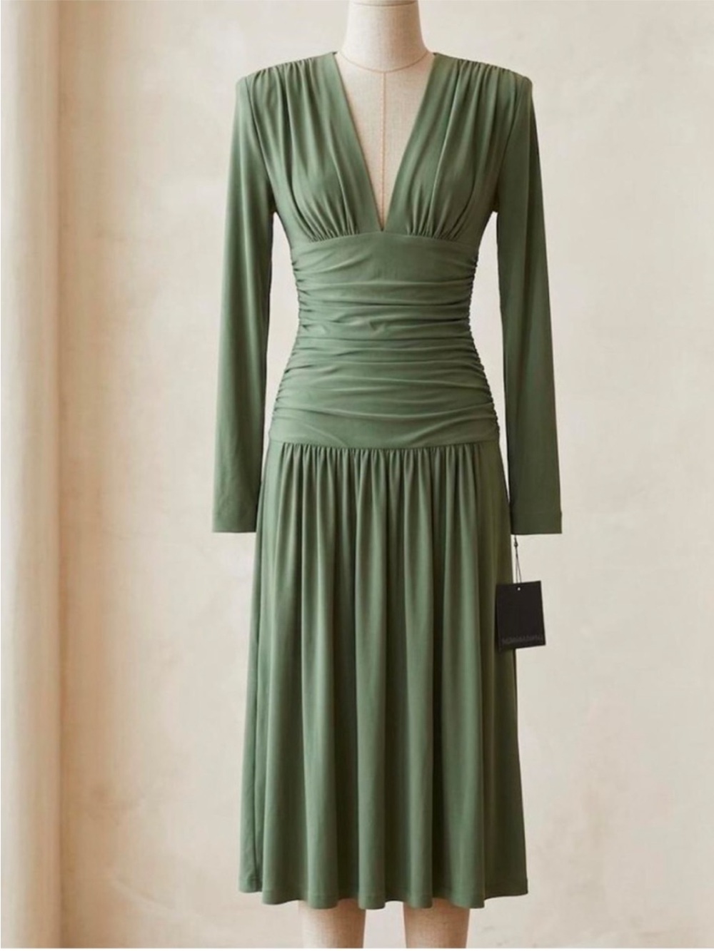 Norma Kamali Midi Dress
Military Green V-Neck Long-Sleeve
Shirred-Waist Large